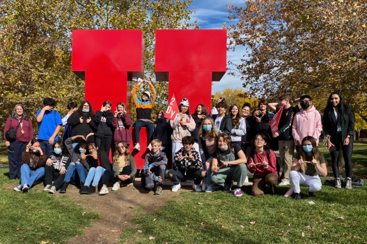 Students in Defining Your Path Program standing next to block U